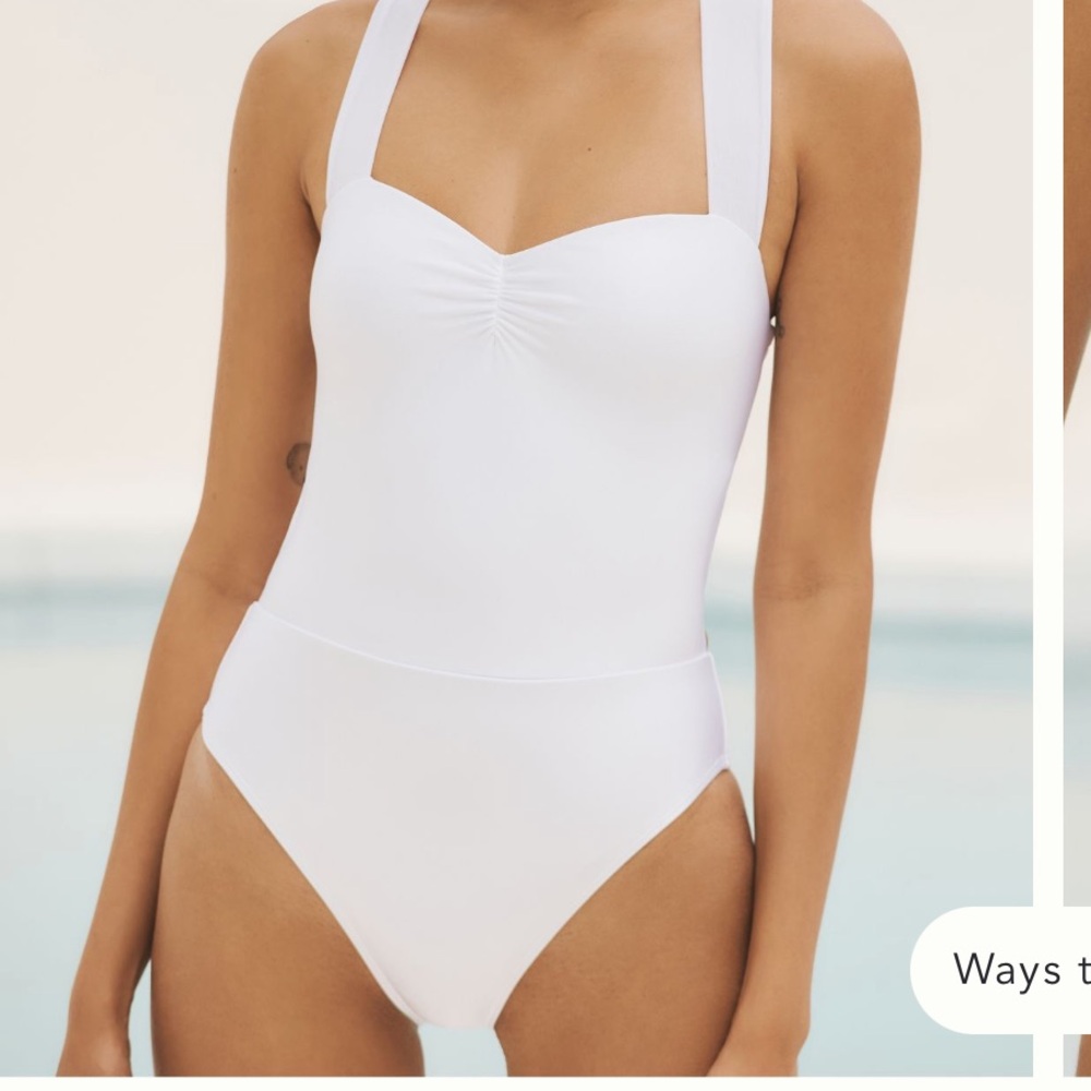 White Dippin Daisies one piece with criss cross back